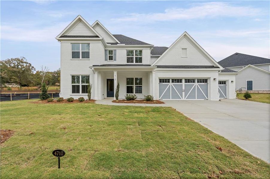 Front exterior of a new home in Rose Creek, Cumming, GA, highlighting curb appeal (Image 24).