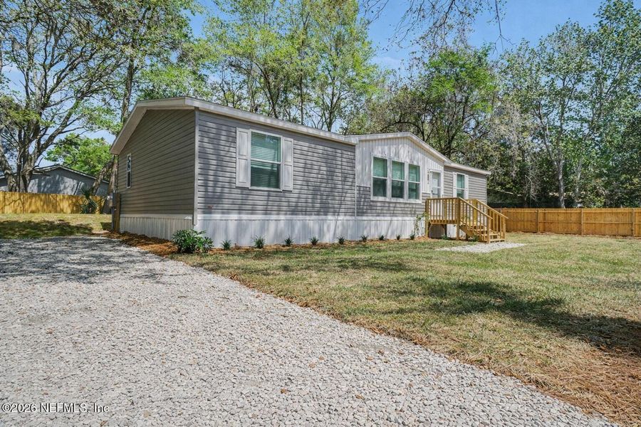 Exterior details and patio area of a home in , Yulee (Image 2). Exterior details and patio area of a home in , Yulee (Image 2).