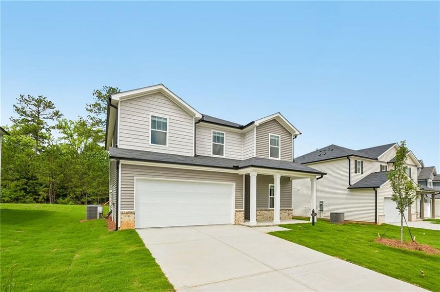 Front exterior of a new home in Manning Mill, Adairsville, GA, highlighting curb appeal (Image 27). Front exterior of a new home in Manning Mill, Adairsville, GA, highlighting curb appeal (Image 27).