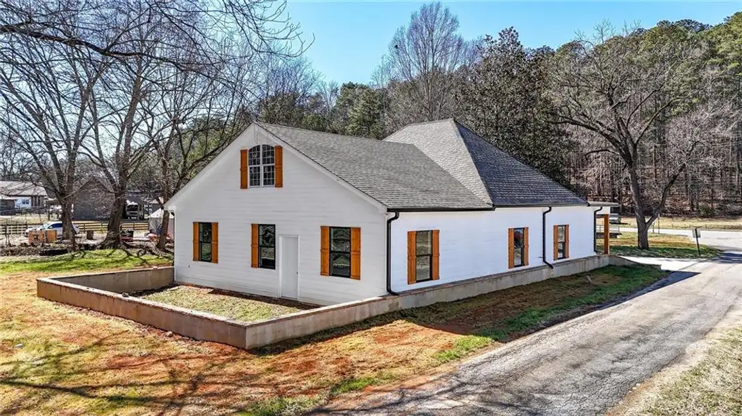 Front exterior of a new home in , Rockmart, GA, highlighting curb appeal (Image 1). Front exterior of a new home in , Rockmart, GA, highlighting curb appeal (Image 1).