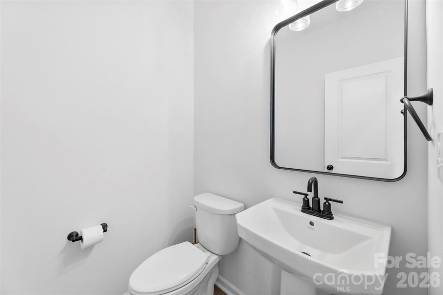 Furnished interior view inside a new home in Surrey Woods, Charlotte (Image 6).