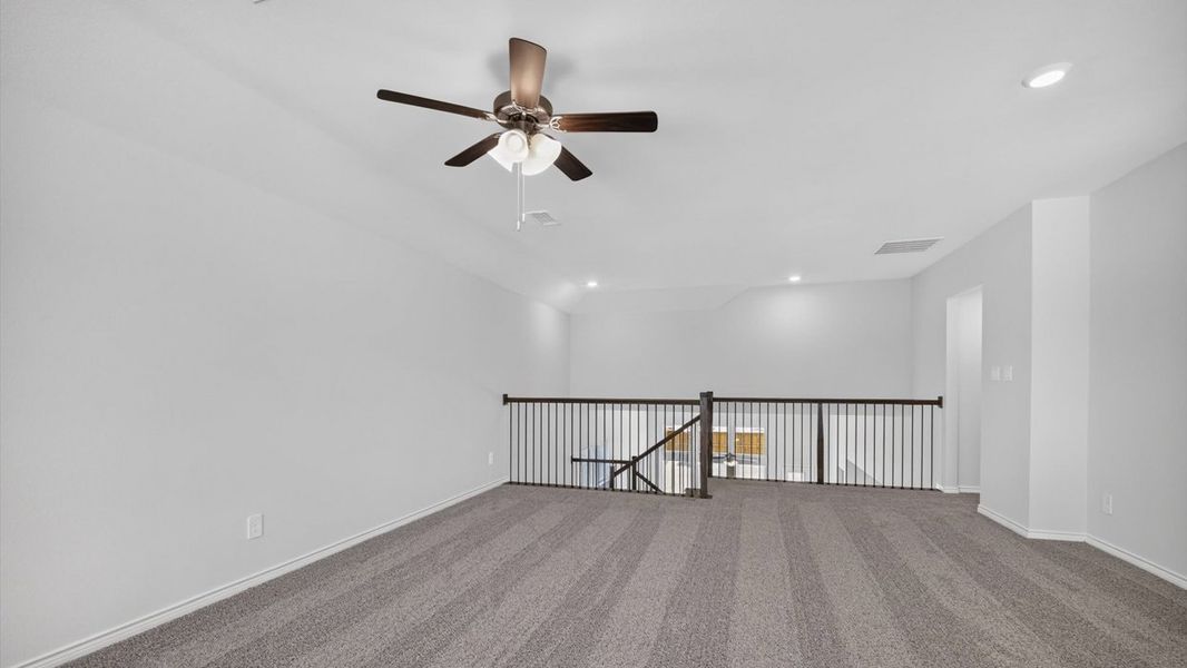Representative unfurnished interior of a home built from the H233 Alpine by D.R. Horton in Lilybrooke at Legacy Hills, Celina (Image 14).