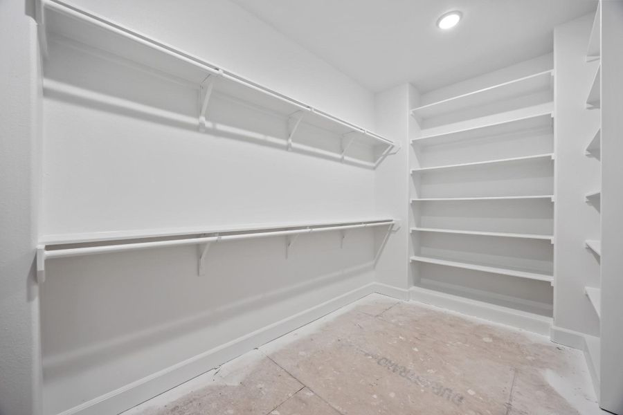 Closet goals = achieved. Built-ins, hanging space, and room for growth make this walk-in feel like a boutique just for you.
