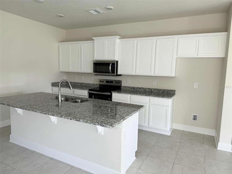 Furnished interior view inside a new home in , St. Cloud (Image 5).