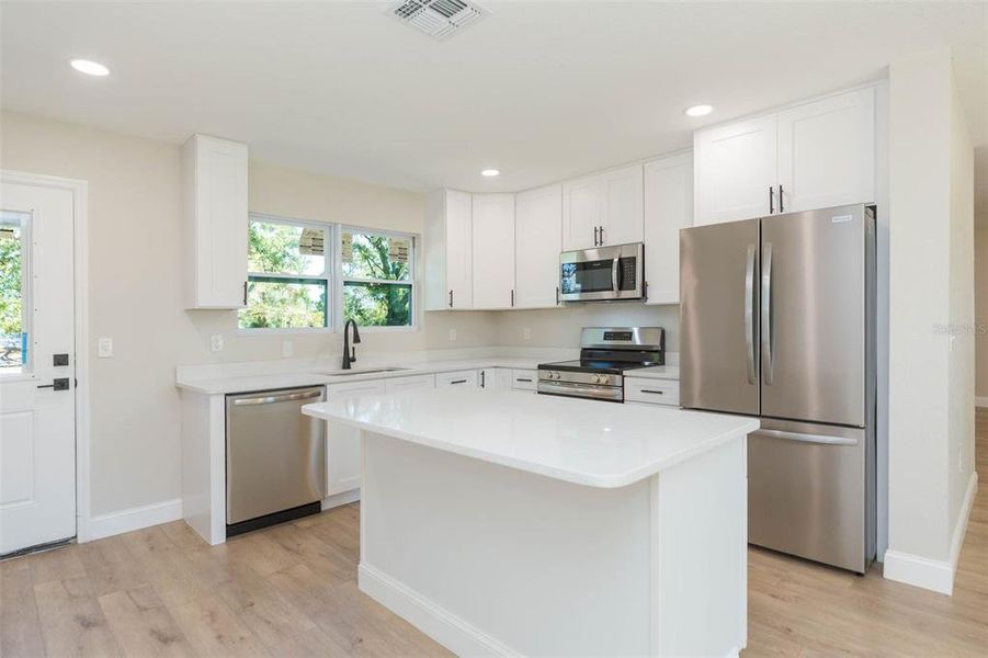 Furnished interior view inside a new home in , Dade City (Image 12).