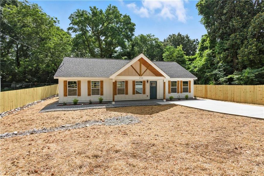 Front exterior of a new home in , Marietta, GA, highlighting curb appeal (Image 18).