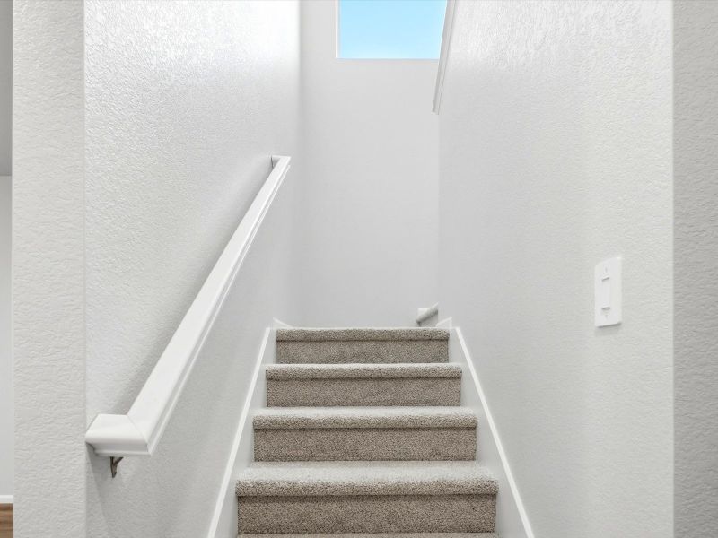 Spacious, unfurnished interior of a new home in Frontier Estates - The Trails Collection, Firestone (Image 10).