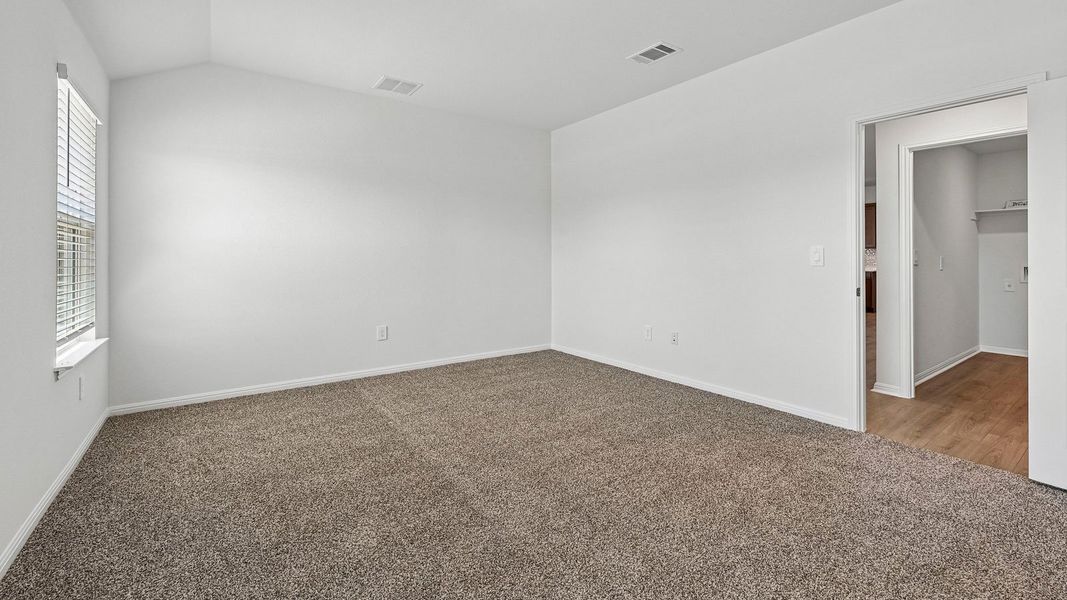 Spacious, unfurnished interior of a new home in Bar W Ranch, Leander (Image 30).