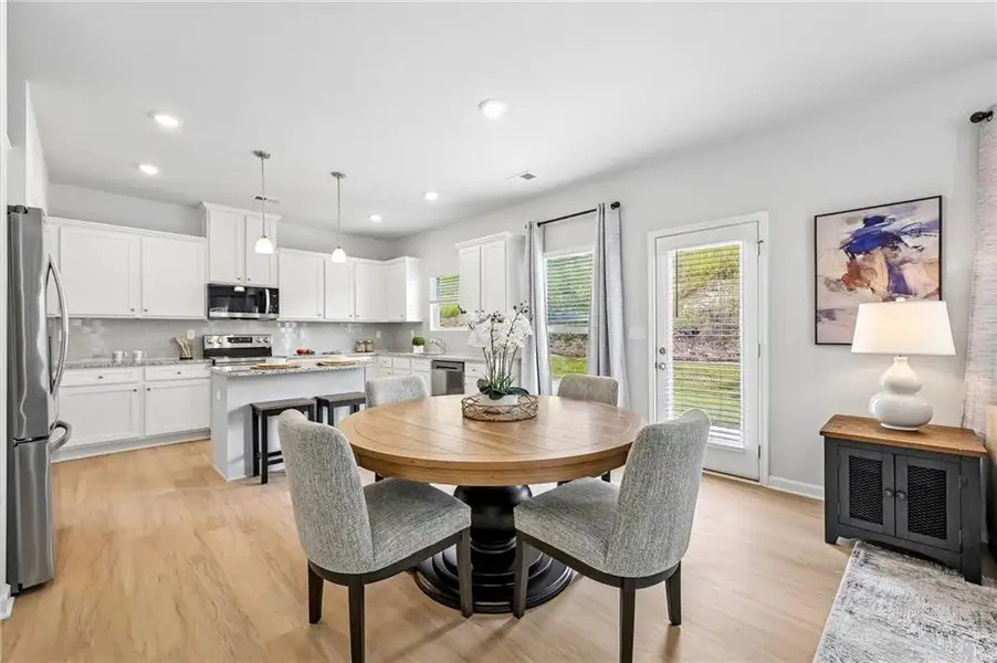 Furnished interior view inside a new home in The Hills at Cedar Creek, Winder (Image 18).