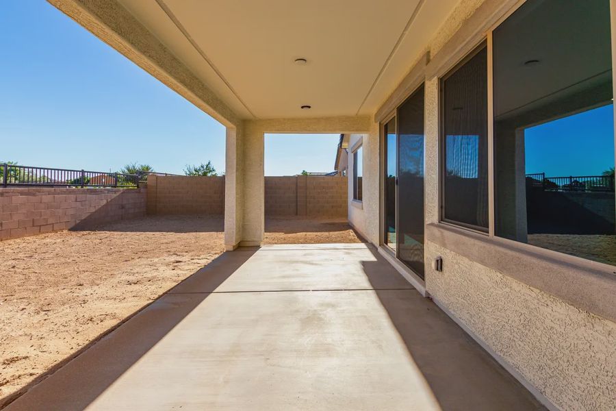 Exterior details and patio area of a home in Avanti at Granite Vista, Waddell (Image 3).