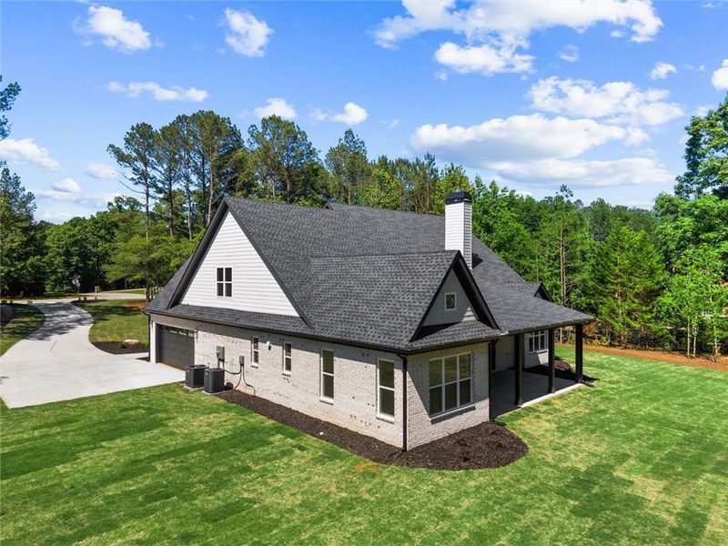 Front exterior of a new home in , Hull, GA, highlighting curb appeal (Image 34).