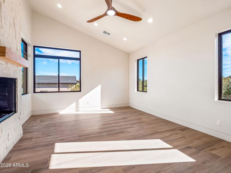 Primary bedroom with fireplace Primary bedroom with fireplace