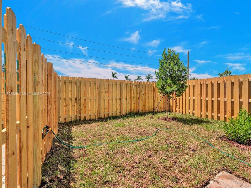Exterior details and patio area of a home in , Homestead (Image 21). Exterior details and patio area of a home in , Homestead (Image 21).