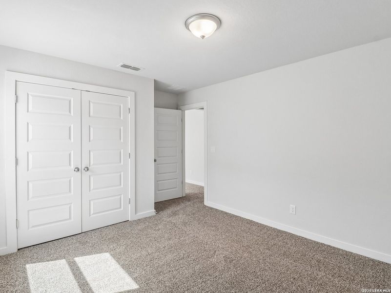 Spacious, unfurnished interior of a new home in Talley Fields, San Antonio (Image 25).