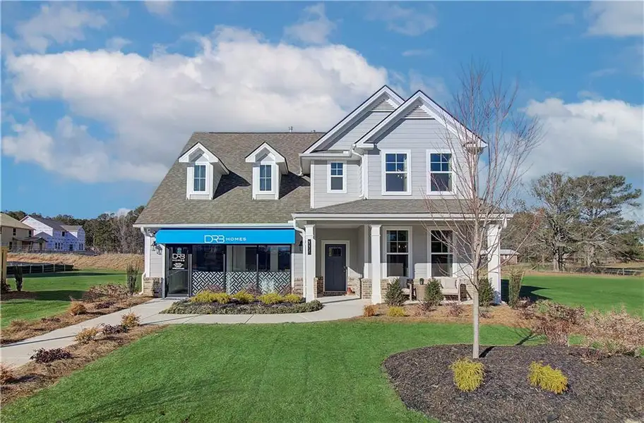 Front exterior of a new home in Cooper Park, McDonough, GA, highlighting curb appeal (Image 1). Front exterior of a new home in Cooper Park, McDonough, GA, highlighting curb appeal (Image 1).