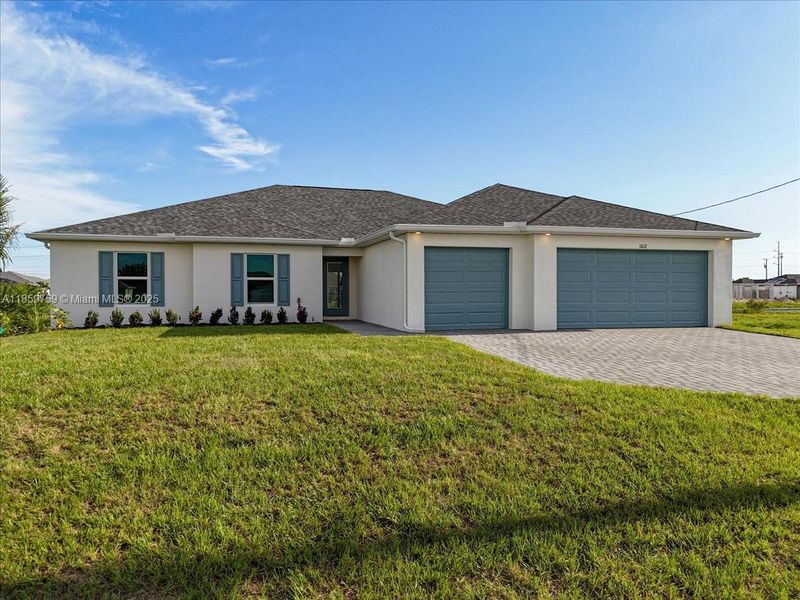 Front exterior of a new home in Cape Coral, Cape Coral, FL, highlighting curb appeal (Image 19).