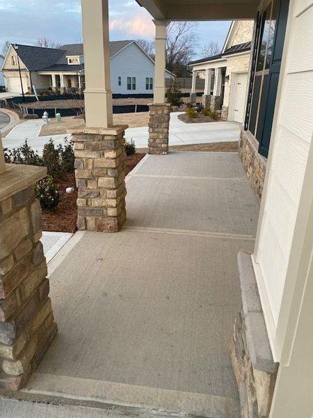 Exterior details and patio area of a home in Soleil Summit Chase, Snellville (Image 30).