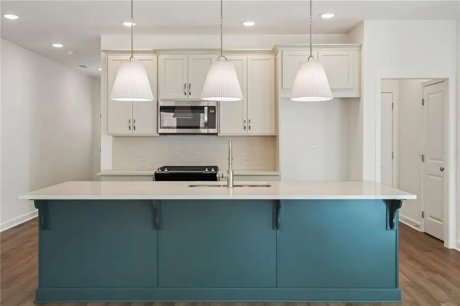 Furnished interior view inside a new home in Bluffs at Bells Ferry, Marietta (Image 3). Furnished interior view inside a new home in Bluffs at Bells Ferry, Marietta (Image 3).