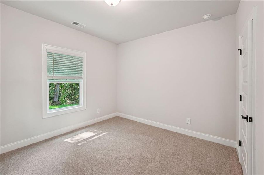 Spacious, unfurnished interior of a new home in Hemingway - Reserve Series, Cumming (Image 40). Spacious, unfurnished interior of a new home in Hemingway - Reserve Series, Cumming (Image 40).