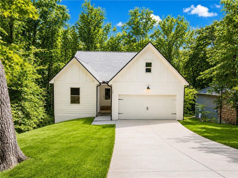 Front exterior of a new home in , Jasper, GA, highlighting curb appeal (Image 1). Front exterior of a new home in , Jasper, GA, highlighting curb appeal (Image 1).
