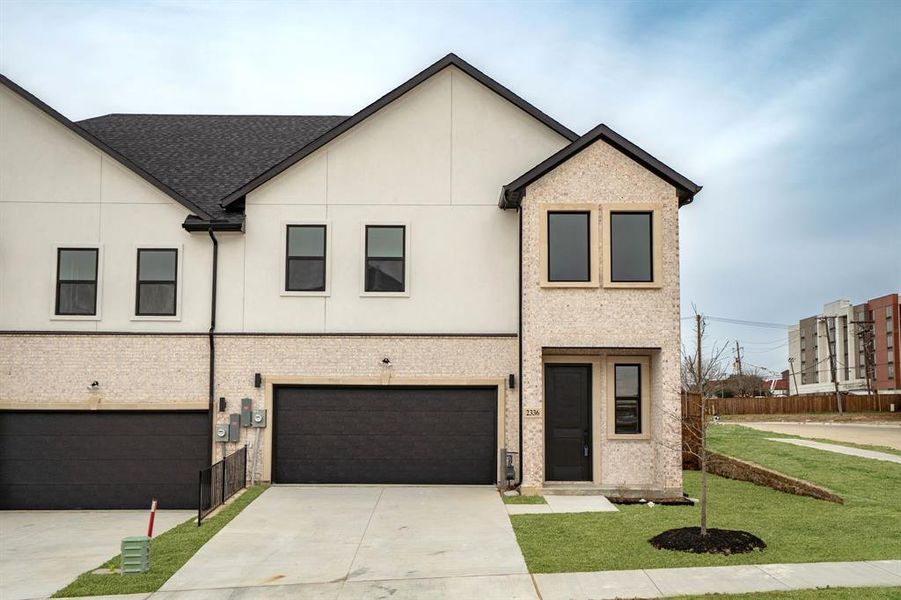 Impressive, brand new contemporary brick and stucco 2-story townhome tucked on a premium corner lot in the heart of Irving in the new exclusive upscale community of Seville Estate. The grass color has been virtually changed to show the home as it should look in spring.