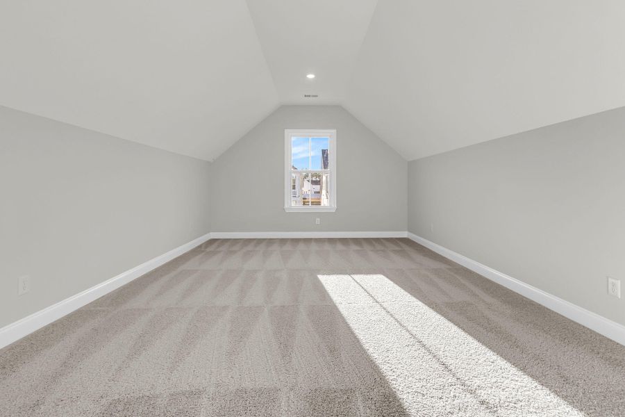 Spacious, unfurnished interior of a new home in Tidewater at Lakes of Cane Bay, Summerville (Image 29).