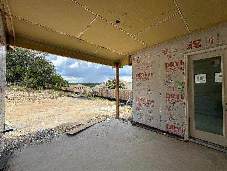 Rear covered Patio and backyard