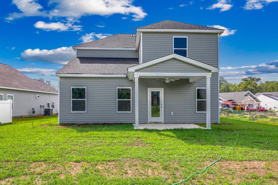 Front exterior of a new home in Six Oaks, Summerville, SC, highlighting curb appeal (Image 24).