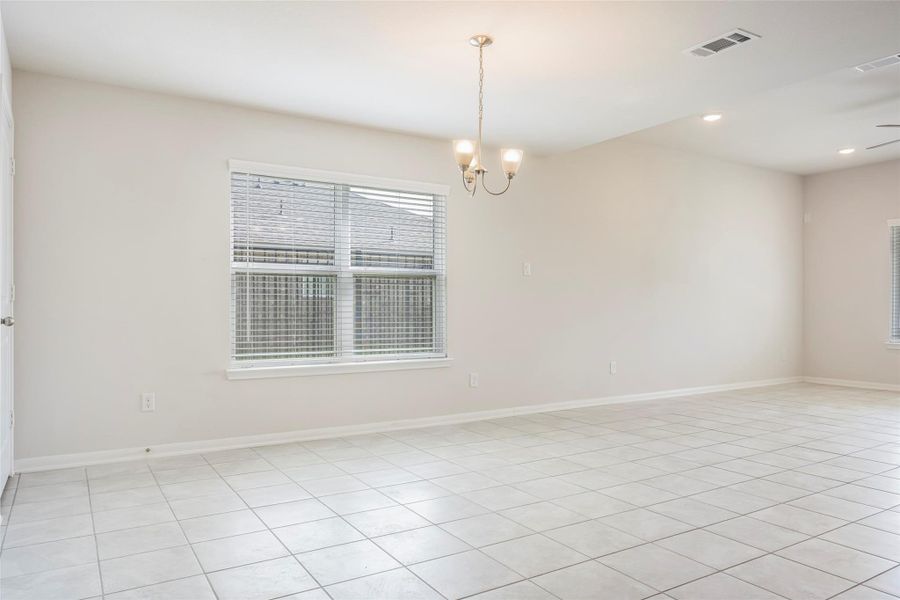 Spacious, unfurnished interior of a new home in Sunterra, Katy (Image 41).