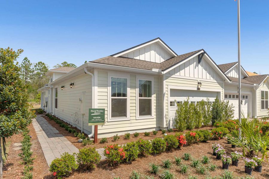 Representative exterior photo of a completed home built from the The Haven by David Weekley Homes in Westerly Park at Wildlight – Villa Collection, Yulee, FL (Image 1). Representative exterior photo of a completed home built from the The Haven by David Weekley Homes in Westerly Park at Wildlight – Villa Collection, Yulee, FL (Image 1).