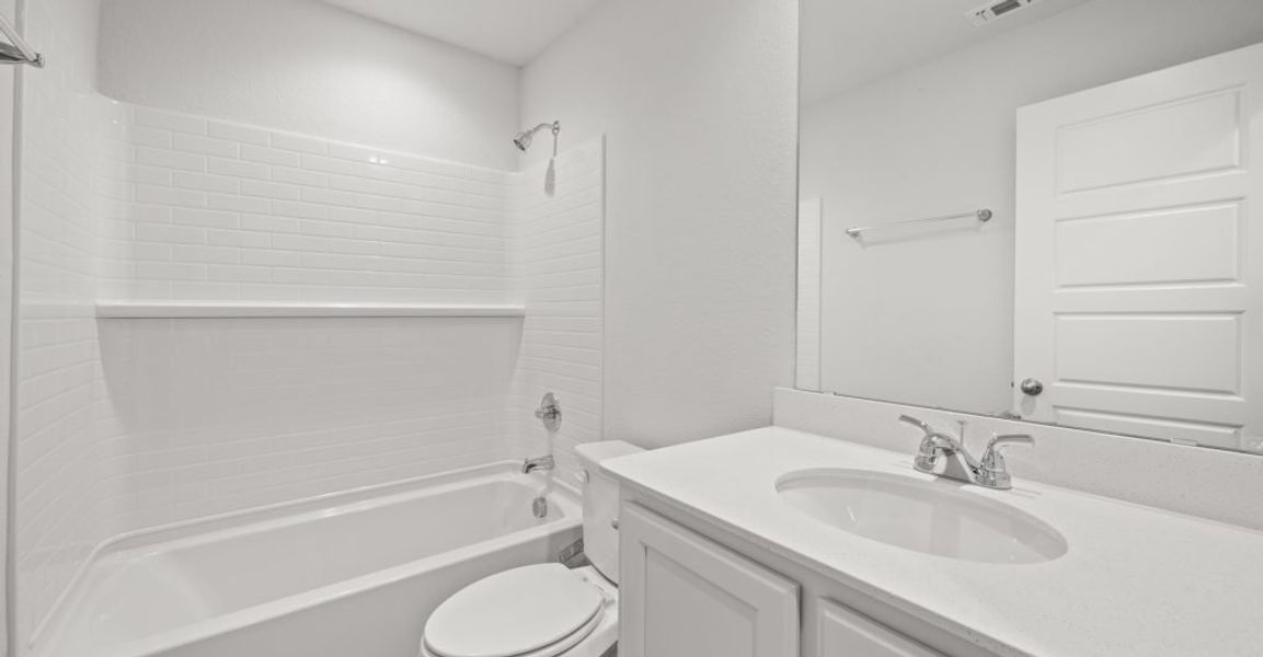 Representative exterior photo of a completed home built from the Lincoln by Impression Homes in Baker Farms, Cleburne, TX (Image 21).