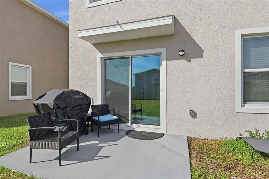 Exterior details and patio area of a home in Farm at Varrea, Plant City (Image 23).