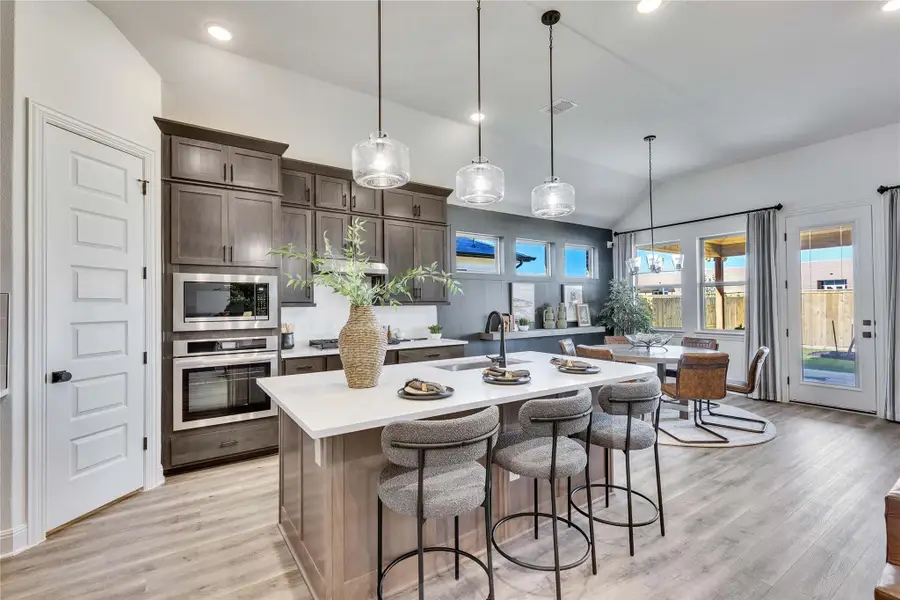 Model home photos of similar floorplans, not pictures of actual home.