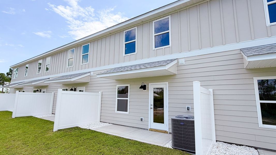 Exterior details and patio area of a home in WindMark Beach, Port Saint Joe (Image 20).