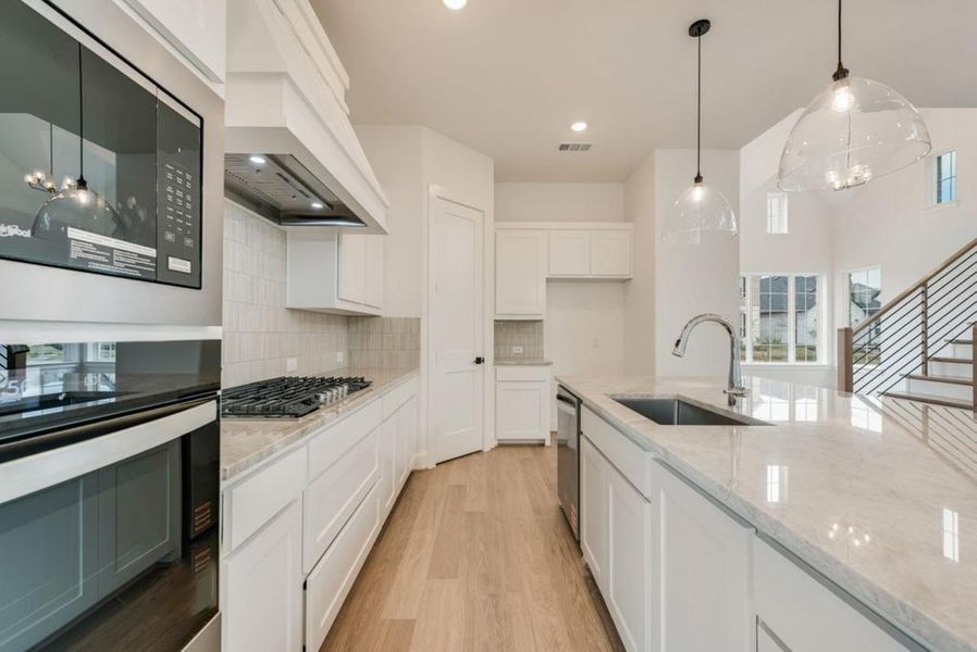 Furnished interior view inside a new home in Edgewater, Fate (Image 11).
