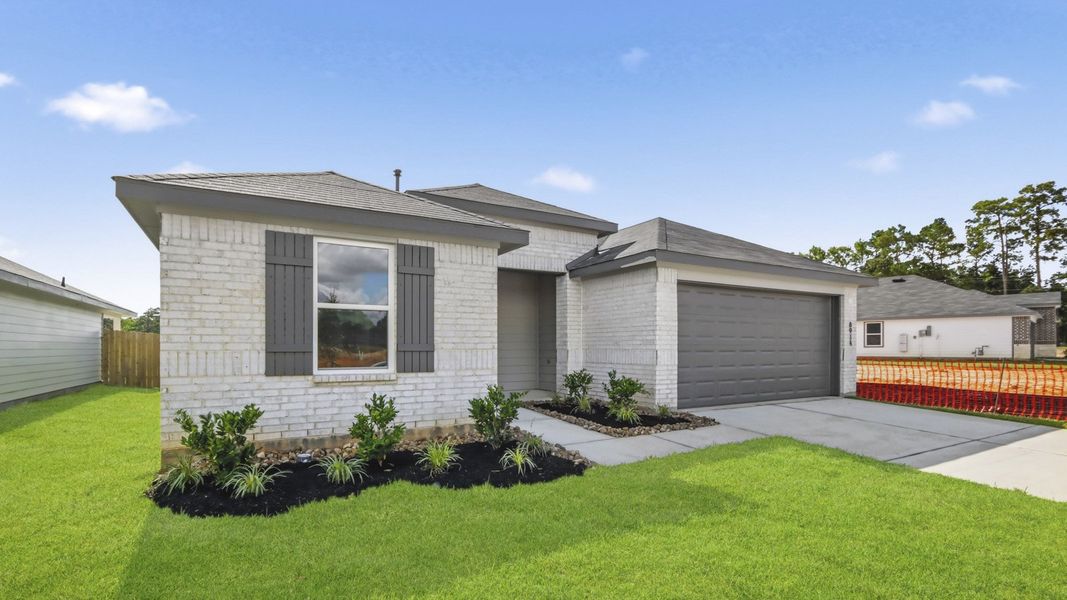 Front exterior of a new home in Chapel Lakes, Montgomery, TX, highlighting curb appeal (Image 16).