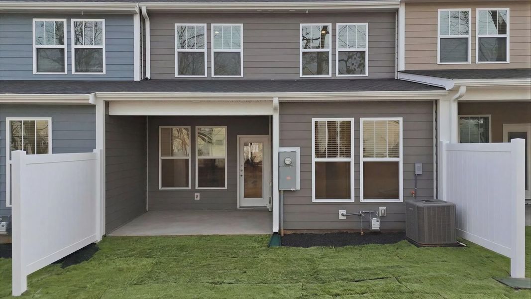 Exclusive rear covered porch with accomplished detail and elevated outdoor living potential at Pelham Crossing