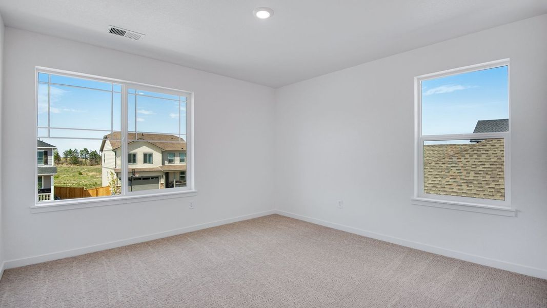 Spacious, unfurnished interior of a new home in Trails at Crowfoot, Parker (Image 38).