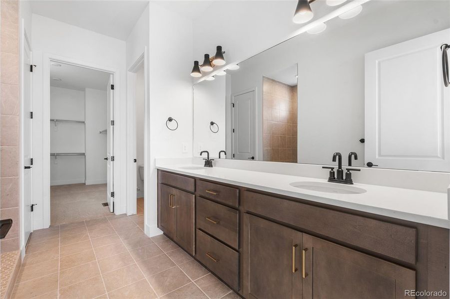 Furnished interior view inside a new home in Hilltop at Inspiration, Aurora (Image 4).