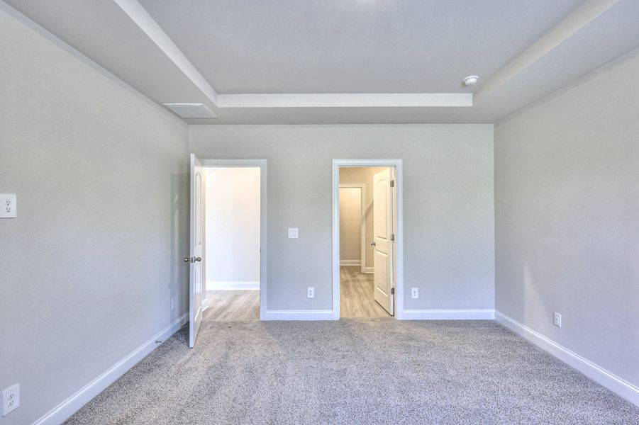 The primary suite offers a private retreat.