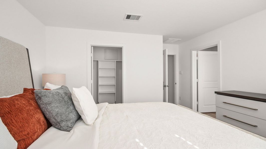 Representative furnished interior of a home built from the 1293 by D.R. Horton in Bridges on Lake Houston Villas, Humble (Image 9).