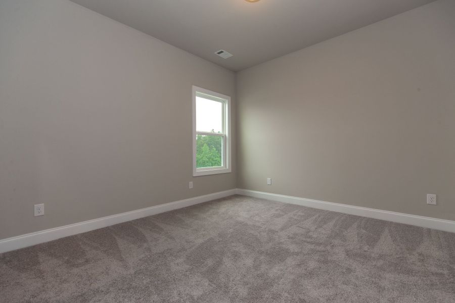 Representative unfurnished interior of a home built from the The Charleston by The Providence Group in Aberdeen, Hoschton (Image 39).