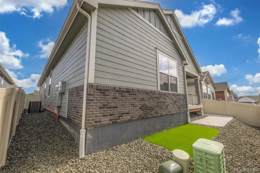 Exterior details and patio area of a home in Green Valley Ranch Active Adult, Aurora (Image 26).