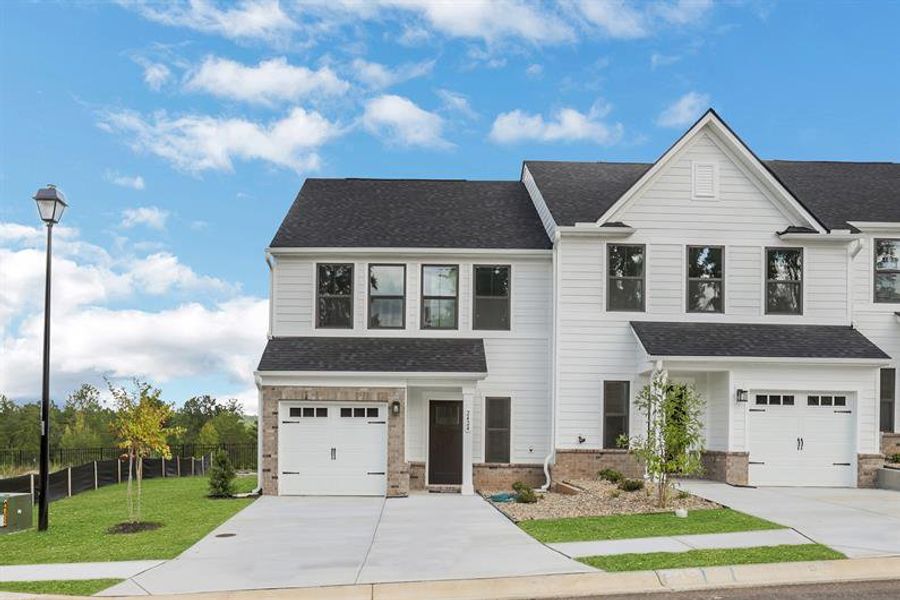 Front exterior of a new home in Laurel Fields, Gainesville, GA, highlighting curb appeal (Image 24).