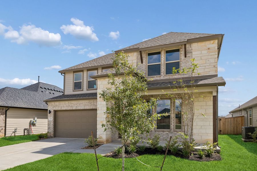 Front exterior of a new home in Riviera Pines, Huffman, TX, highlighting curb appeal (Image 20).