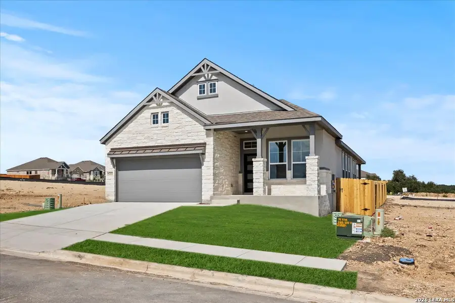 Front exterior of a new home in Meyer Ranch, New Braunfels, TX, highlighting curb appeal (Image 1). Front exterior of a new home in Meyer Ranch, New Braunfels, TX, highlighting curb appeal (Image 1).