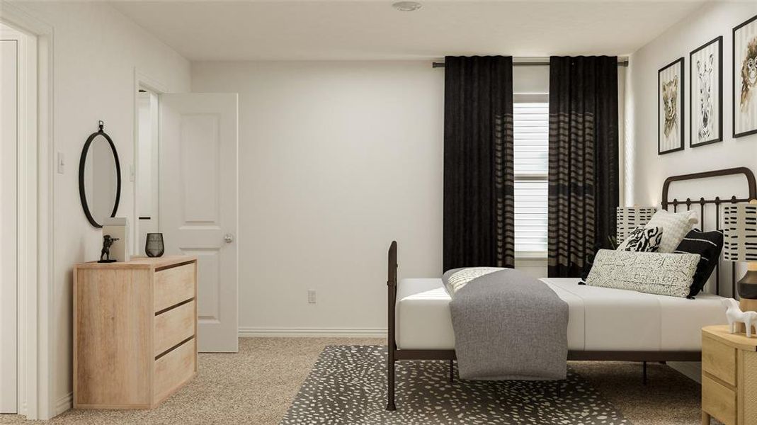 Bedroom featuring light colored carpet