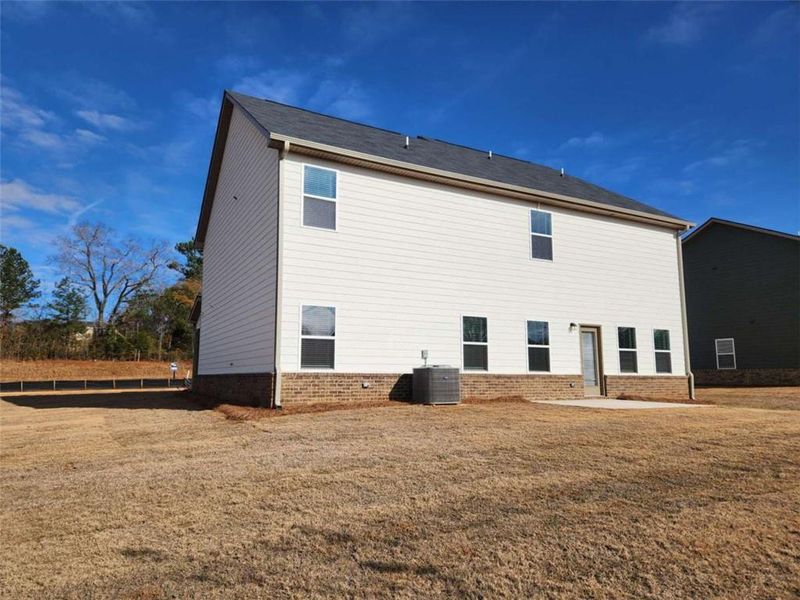 Exterior details and patio area of a home in Southern Hills, McDonough (Image 4).