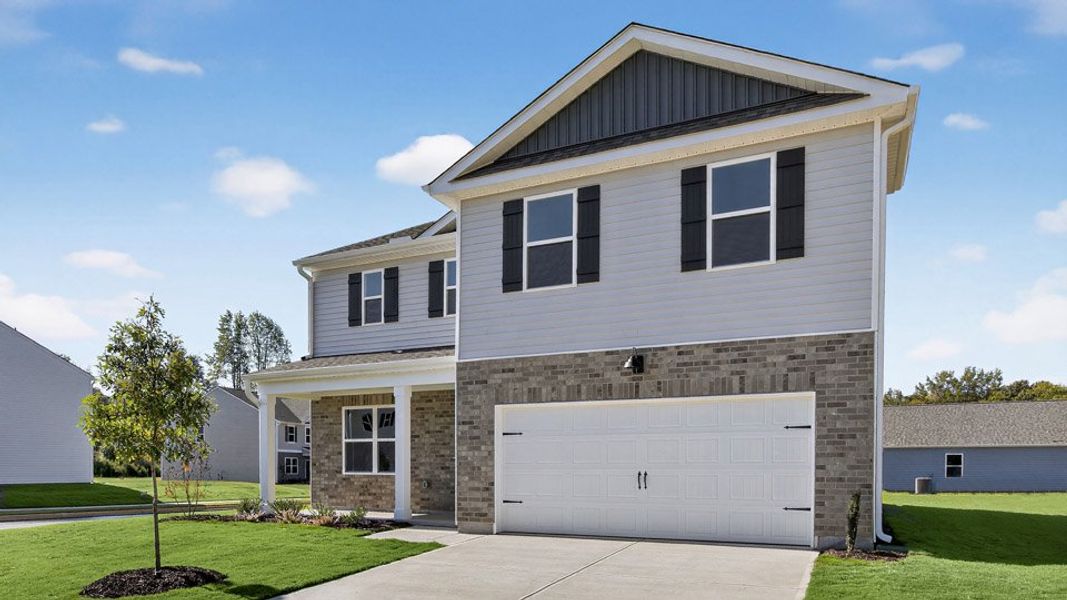 Front exterior of a new home in Martin Farms, Aberdeen, NC, highlighting curb appeal (Image 2). Front exterior of a new home in Martin Farms, Aberdeen, NC, highlighting curb appeal (Image 2).