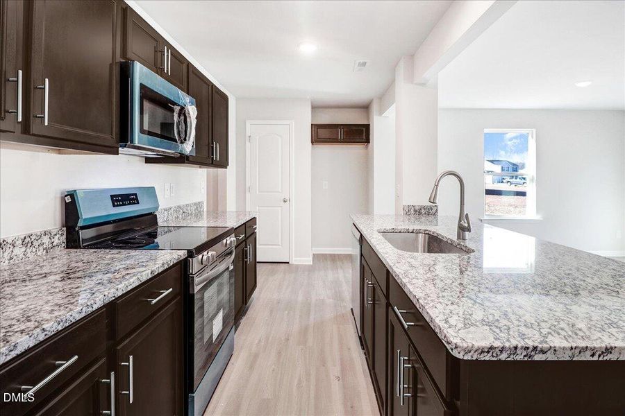 24-Kitchen island with sink and seating
